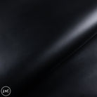 Black leather texture with a subtle grain pattern