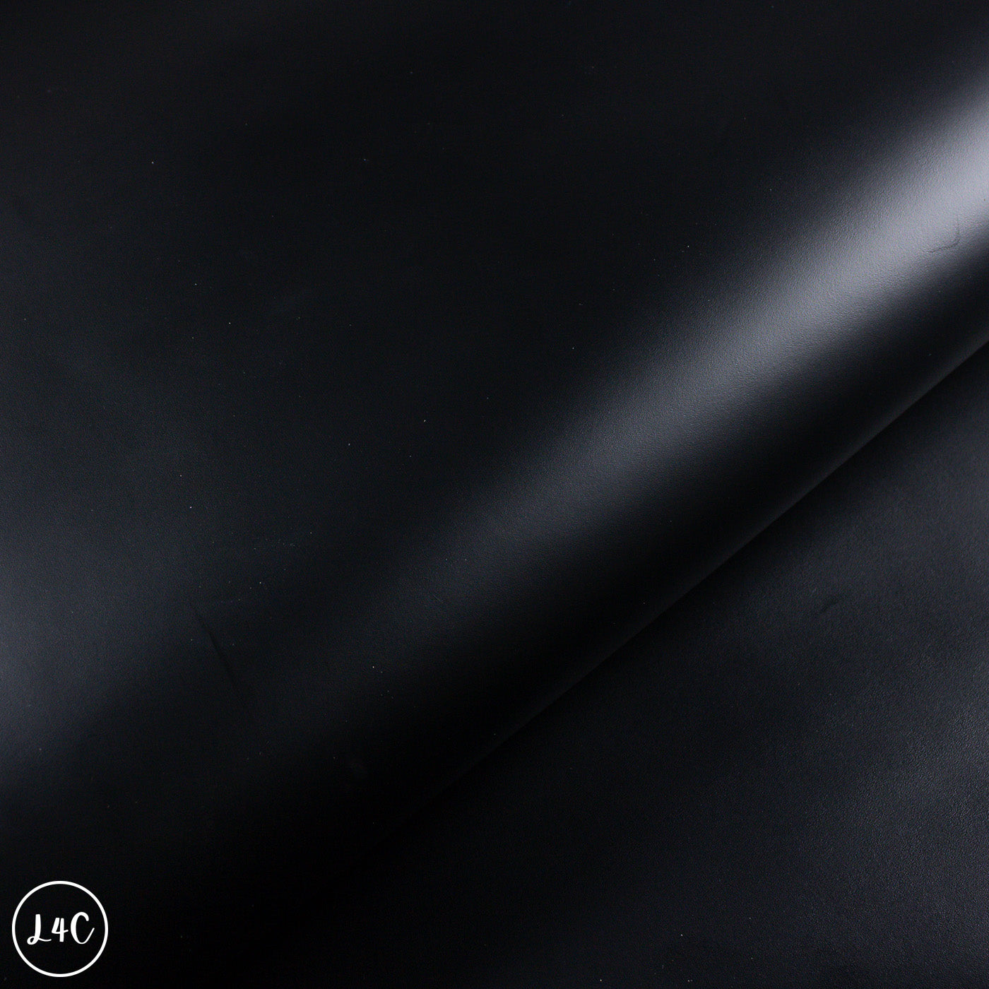 Black leather texture with a subtle grain pattern