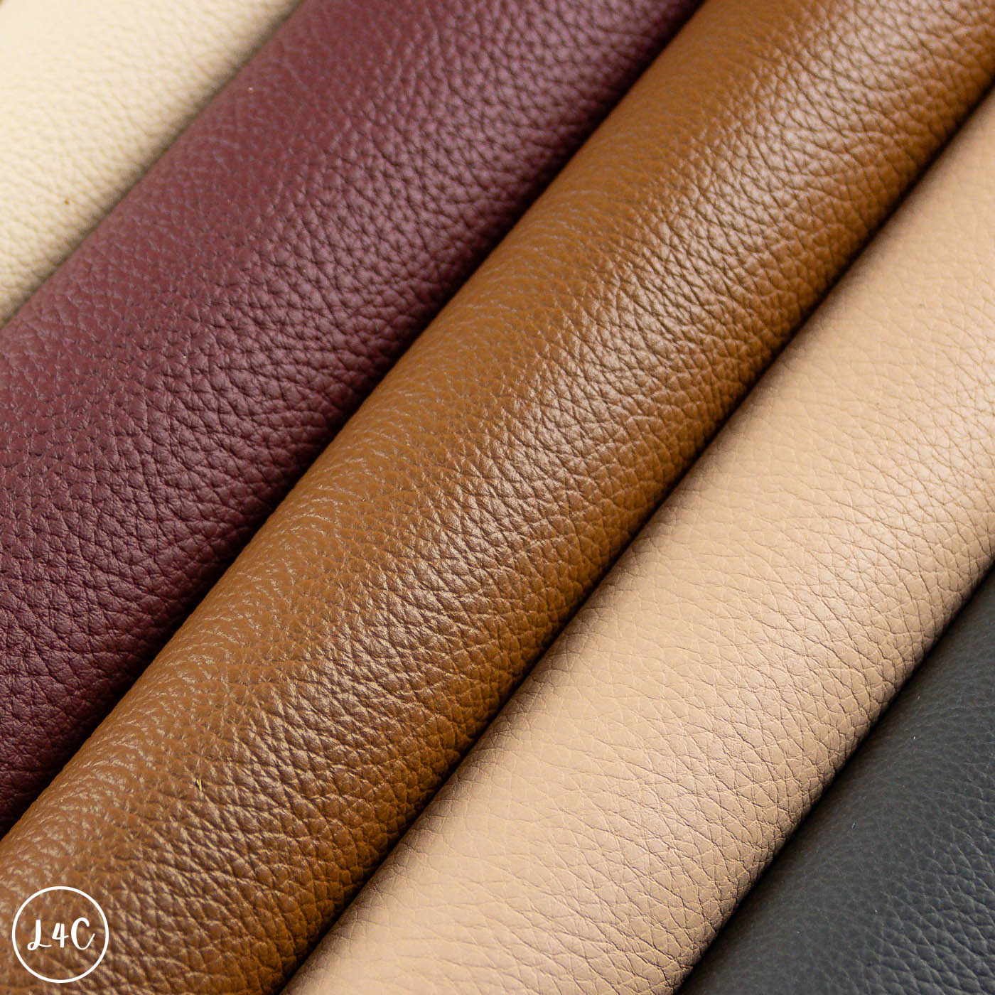 Close-up of leather swatches in various colors including brown, beige, and purple.