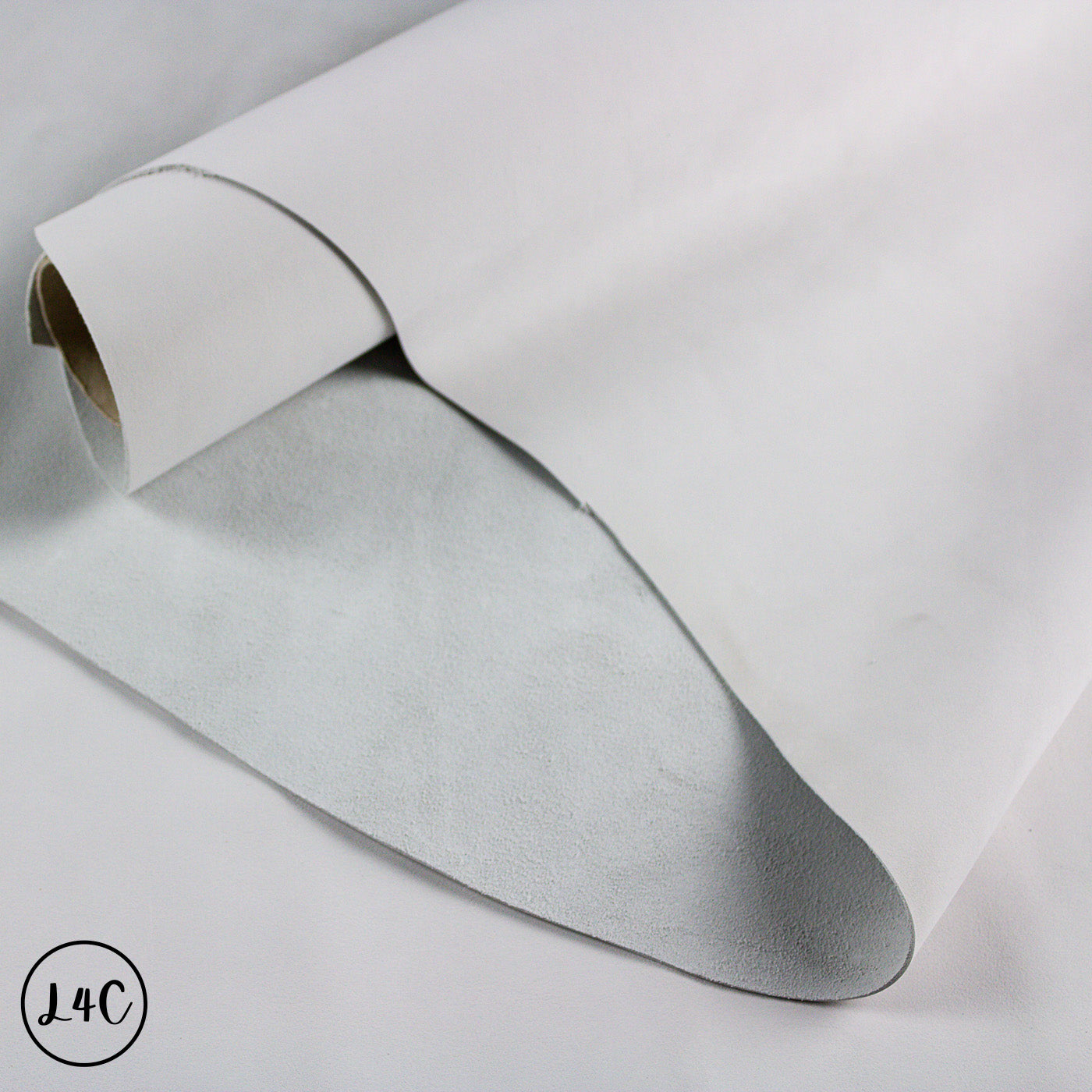 Roll of gray leather on a light gray background
